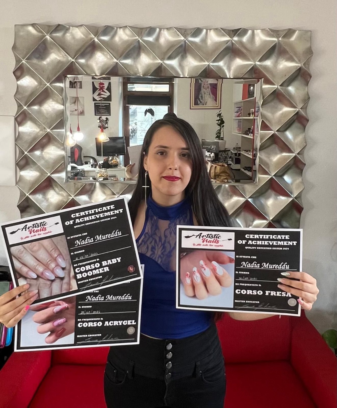 Nadia con tre attestati